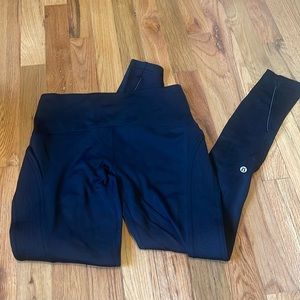 Lululemon Black Fleece Lined Leggings with reflective on legs, Size 4